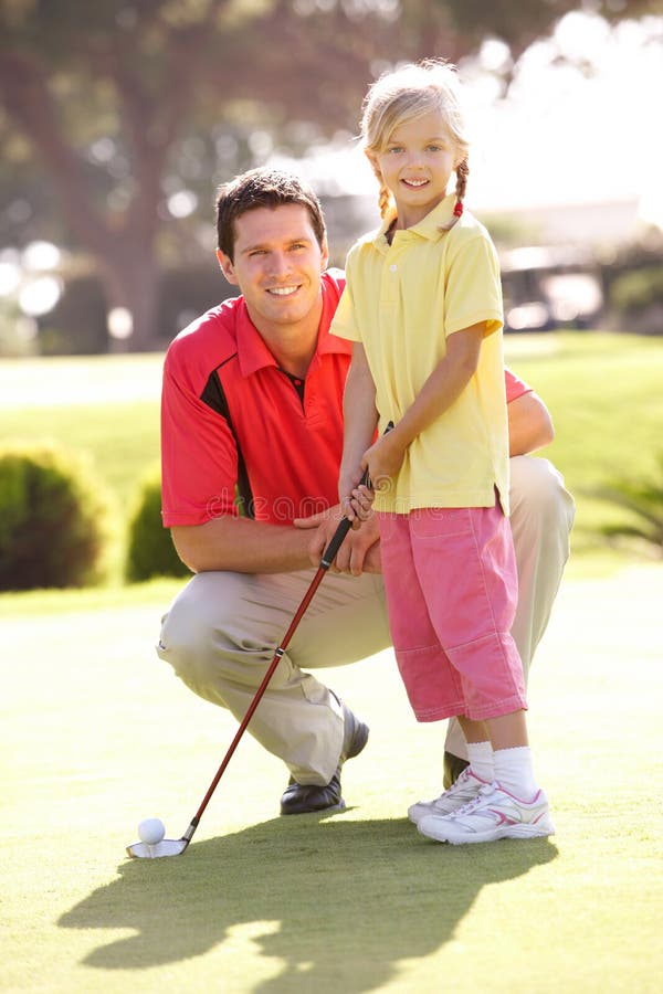 Father Teaching Daughter To Play Golf Stock Photo Image of sport