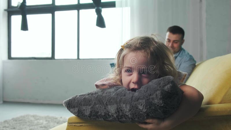 Father Tickling His Daughter while they Play Together at Home. Stock Footage - Video of children, hugging: 216607388
