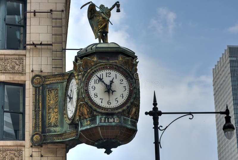 Father Time clock, the 1926 decorative Jewelers' Building clock in Chicago is emblazoned with the word Time and decorated with a statue of old Father Time carrying a menacing scythe. Father Time clock, the 1926 decorative Jewelers' Building clock in Chicago is emblazoned with the word Time and decorated with a statue of old Father Time carrying a menacing scythe.