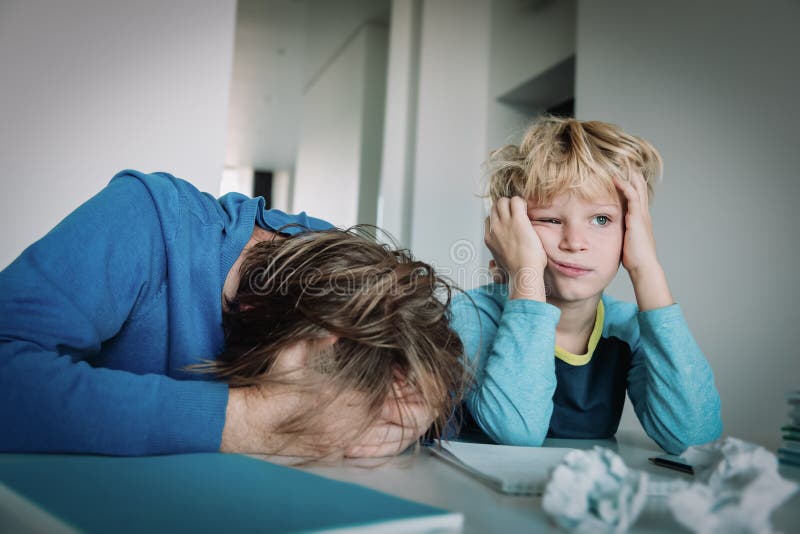 Father Tired of Doing Homework with Son, Difficult Learning Stock Photo ...