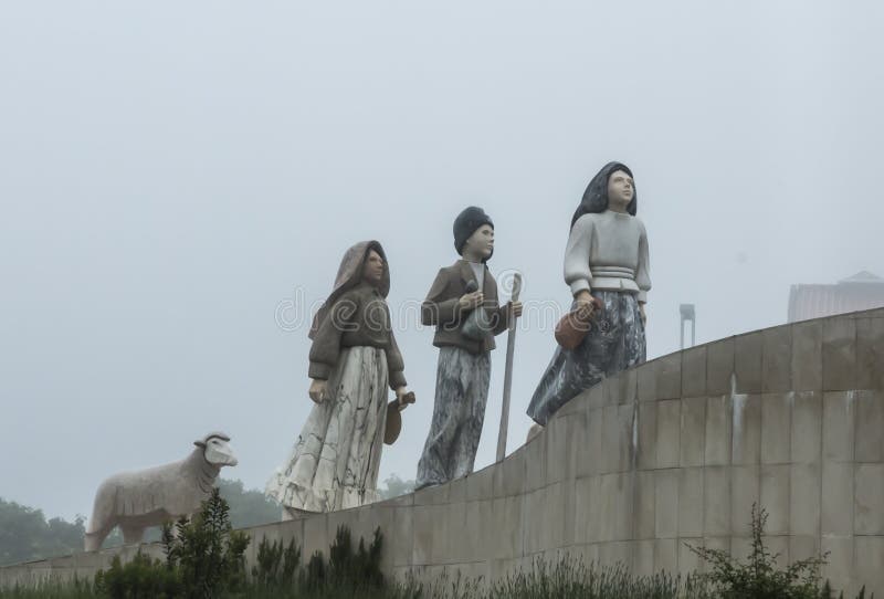 Fatima, Portugal, June 12, 2018: Children from Fatima, a small architectural monument on one of the roundabouts in Fatima