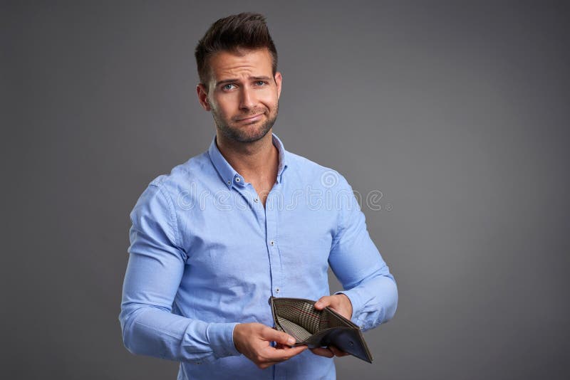 Fattig ung man arkivfoto Fattig ung man arkivfoto