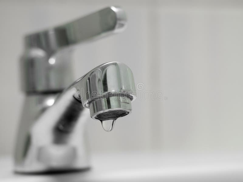 The Faucet is Not Properly Closed, the Water is Draining from the Tap. Stock Image Image of
