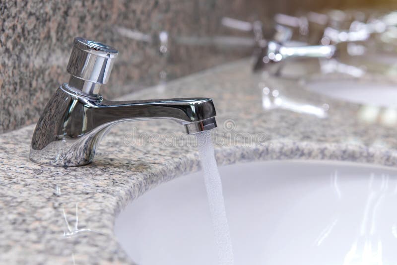Bathroom Faucet Open And Running With Water Flow Stock Photo Image of