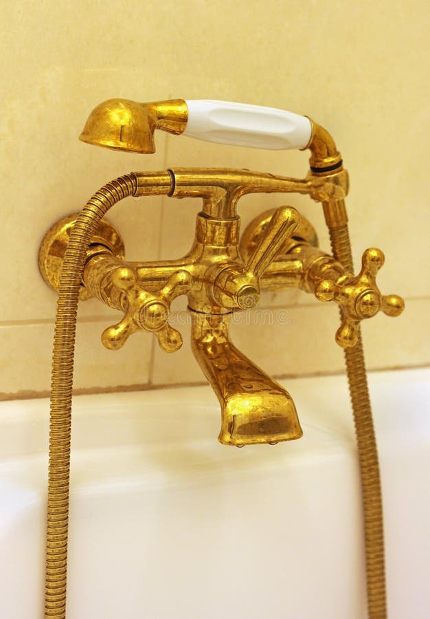 Faucet золота стоковое изображение rf Faucet золота стоковое изображение rf