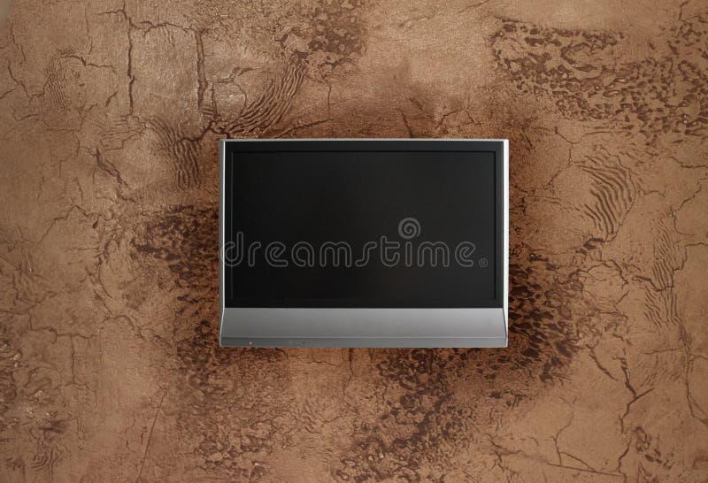 Faux painted stucco wall with LCD tv