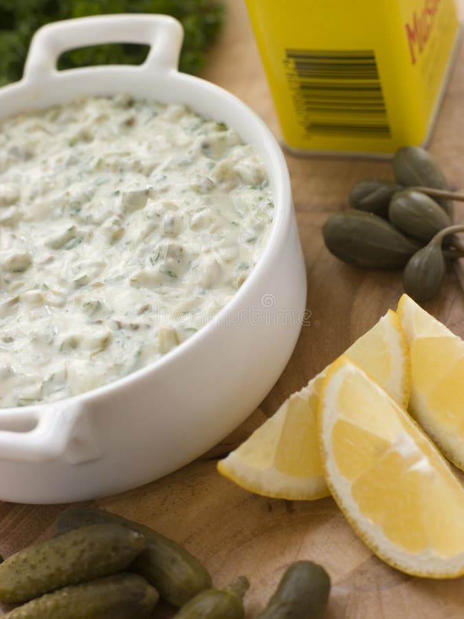 Making Tartare Sauce with Lemons, Pickles, Mustard amd Parsley. Making Tartare Sauce with Lemons, Pickles, Mustard amd Parsley