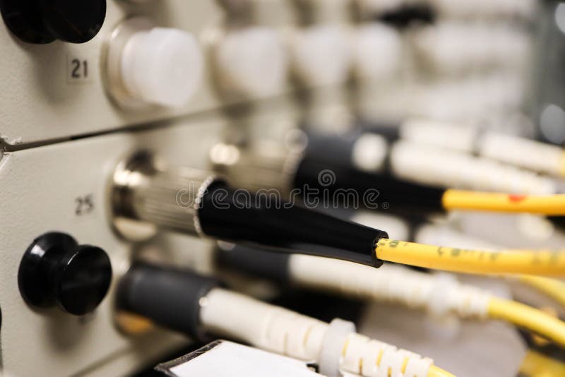 FC fiber cross connect patch panel with fiber optic close up view stock images