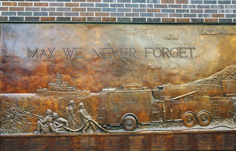 FDNY memorial wall is a monument at ground zero dedicated to the firefighters who died in 9/11 and to those who carry on. FDNY memorial wall is a monument at ground zero dedicated to the firefighters who died in 9/11 and to those who carry on.