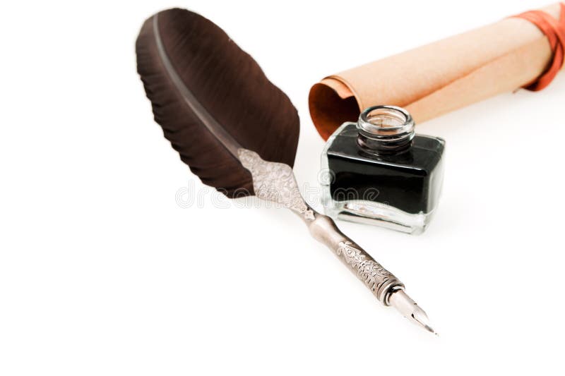 Feather quill ,inkwell and parchment roll