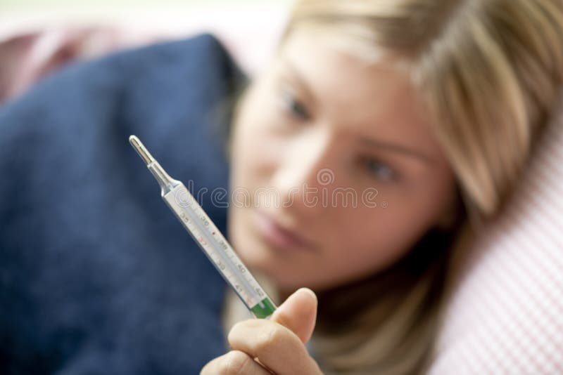 Medir a febre imagem de stock