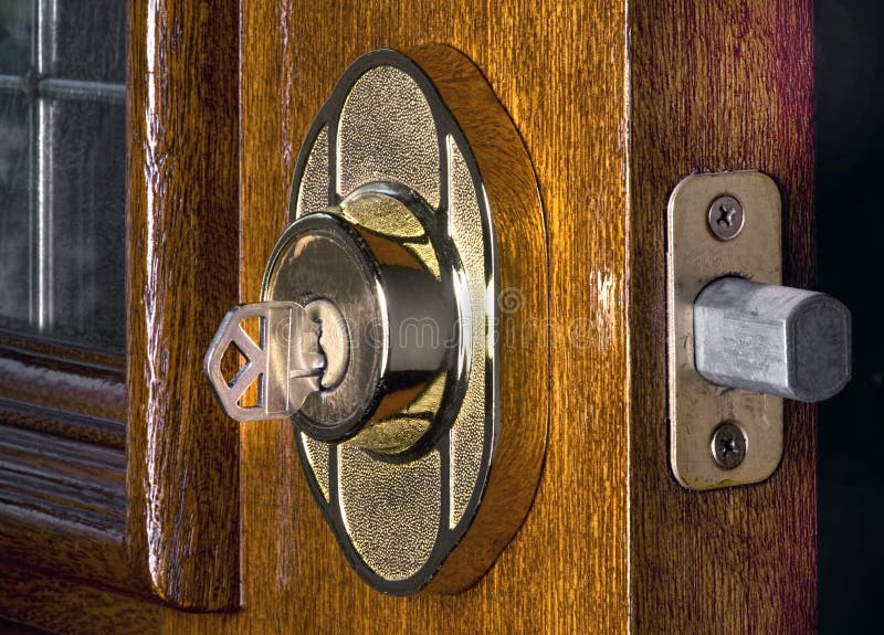 Fechamento do Deadbolt fotografia de stock royalty free Fechamento do Deadbolt fotografia de stock royalty free