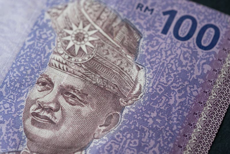 Fechamento do ringgit malaysia 100 moeda malaia fotografia de stock