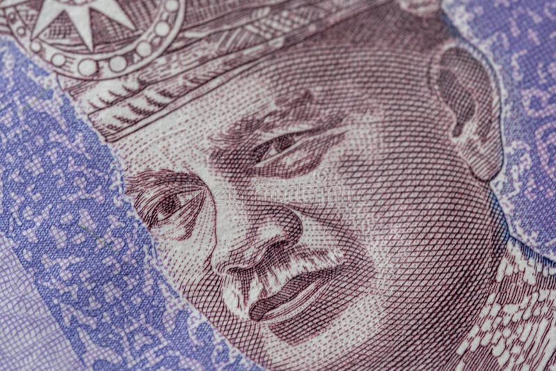 Fechamento do ringgit malaysia 100 moeda malaia fotografia de stock