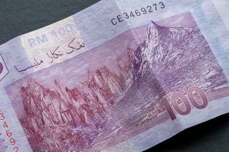 Fechamento do ringgit malaysia 100 moeda malaia fotos de stock