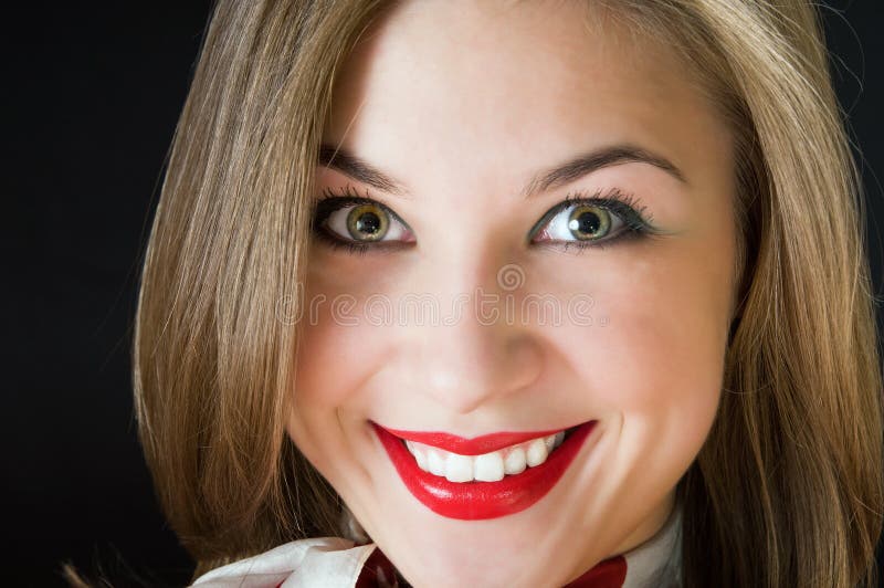 Feche acima da face da menina de sorriso fotos de stock Feche acima da face da menina de sorriso fotos de stock