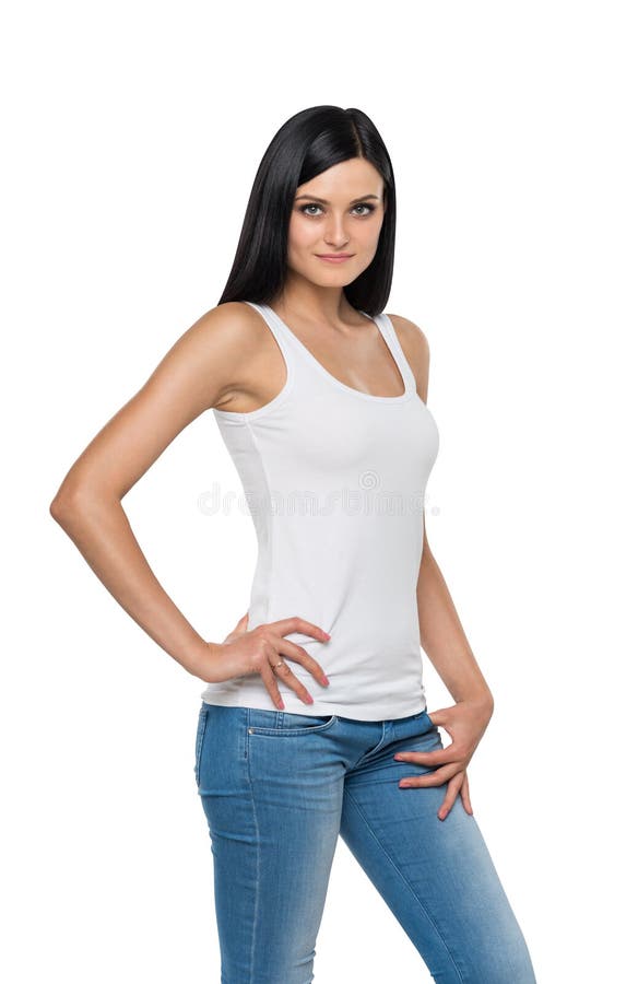 Feche acima da menina moreno nas sarjas de Nimes e na camiseta de alças branca fotos de stock Feche acima da menina moreno nas sarjas de Nimes e na camiseta de alças branca fotos de stock