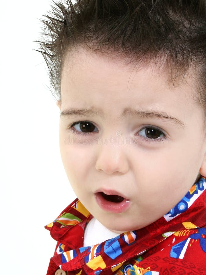 Feche acima de ToddlerBoy com expressão da virada imagem de stock Feche acima de ToddlerBoy com expressão da virada imagem de stock