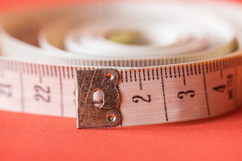 Feche acima do alfaiate Measuring Tape imagens de stock royalty free Feche acima do alfaiate Measuring Tape imagens de stock royalty free