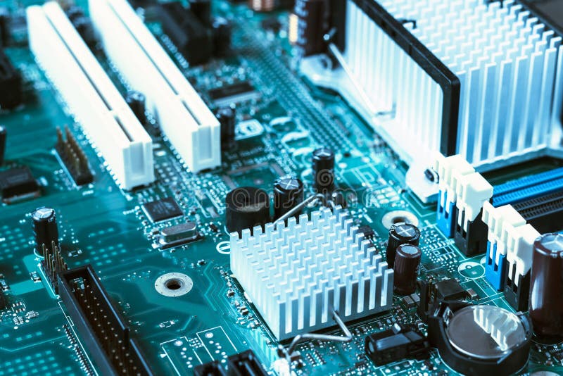 Feche acima do cartão-matriz tonificado azul do computador imagens de stock Feche acima do cartão-matriz tonificado azul do computador imagens de stock