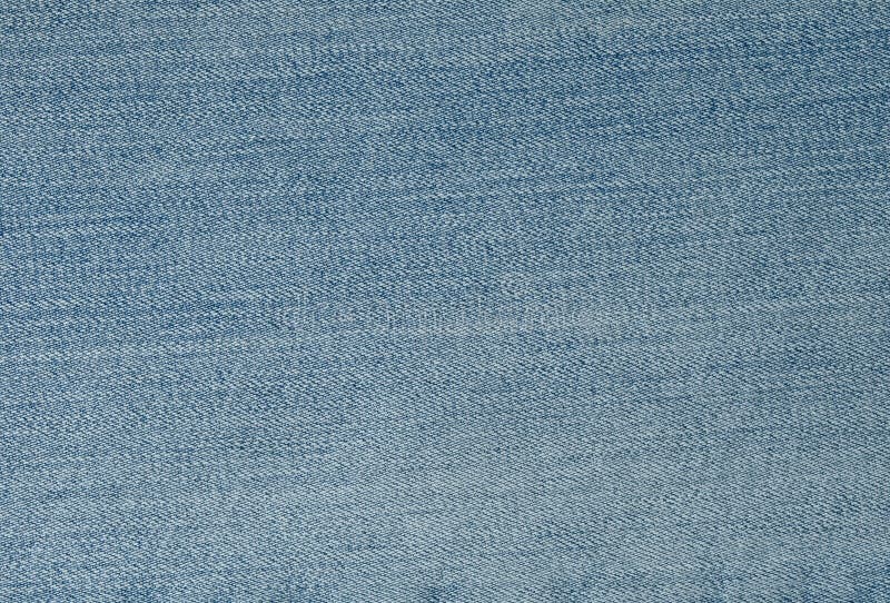 Feche acima do teste padrão do fundo da sarja de Nimes azul Jean Texture fotos de stock royalty free Feche acima do teste padrão do fundo da sarja de Nimes azul Jean Texture fotos de stock royalty free