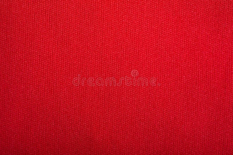 Feche acima a textura do material alaranjado de pano fotos de stock Feche acima a textura do material alaranjado de pano fotos de stock