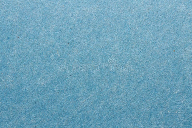 Feche a macro-captura de papel azul de construção mostrando textura em fibras de papel impermeáveis e muito mais. a imagem perfeit