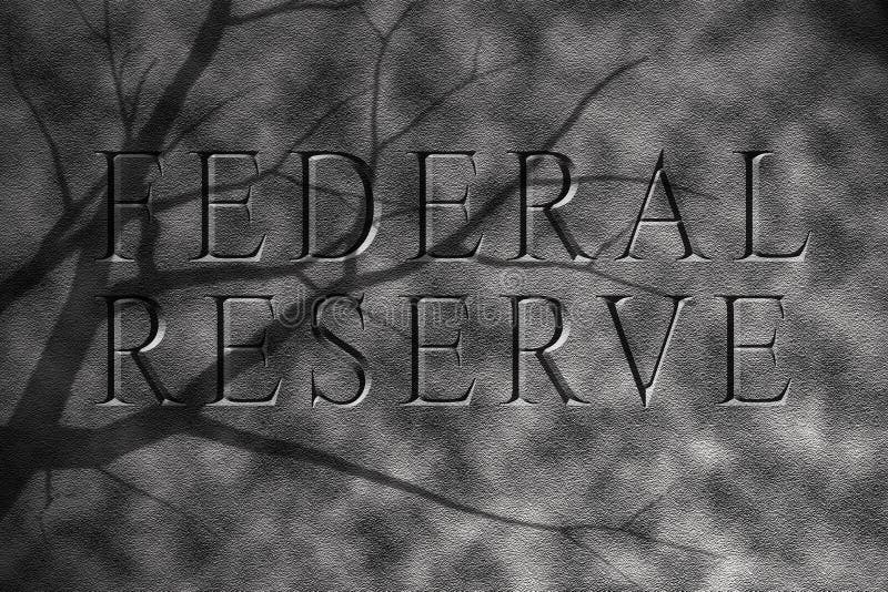 Federal reserve of america text in granite stone showing bleak future. Federal reserve of america text in granite stone showing bleak future