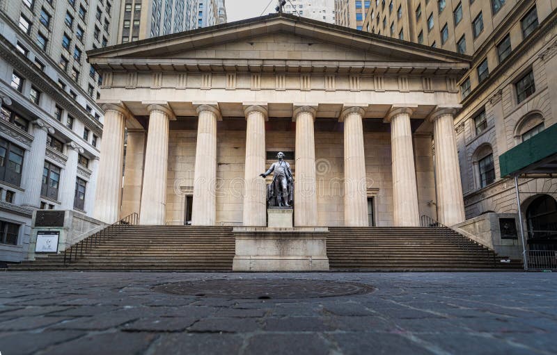 Federal Hall with a statue of George Washington  on Wall Street in Manhattan, New York.  Museum in 1842 Customs House on site where Washington was sworn in & the Bill of Rights was written. Federal Hall with a statue of George Washington  on Wall Street in Manhattan, New York.  Museum in 1842 Customs House on site where Washington was sworn in & the Bill of Rights was written