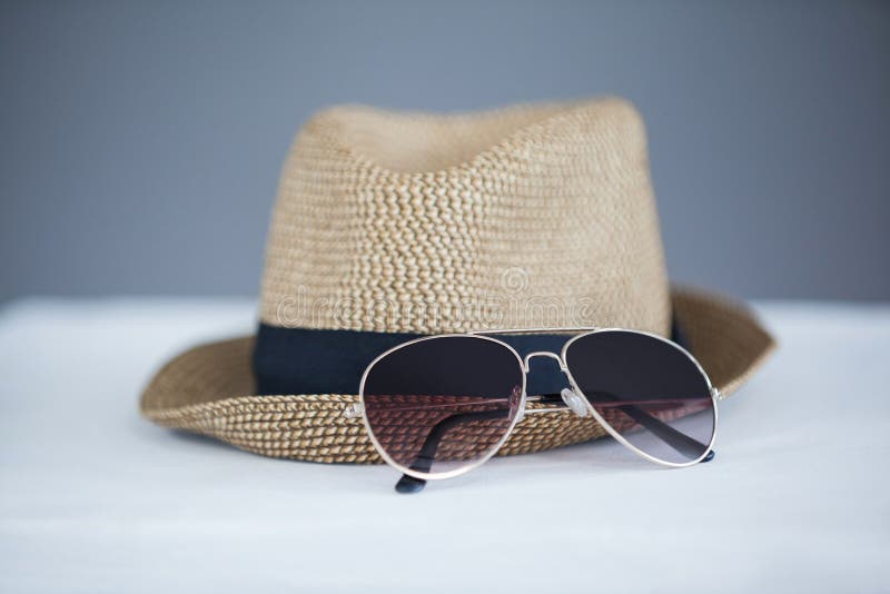 Fedora Hat And Sunglasses Over Wooden Table Stock Image Image of