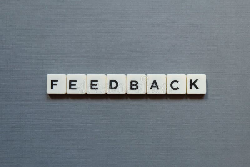 Feedback Word Made of Square Letter Word on Grey Background. Stock