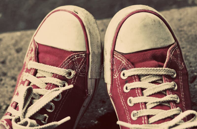 Feet in Dirty Red Sneakers and Jeans Outdoors. Stock Photo - Image of ...