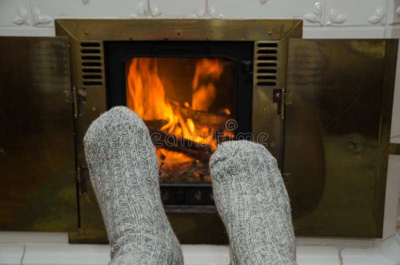 A Pair Of Feet And A Cozy Fire Stock Photo Image of blaze, coals
