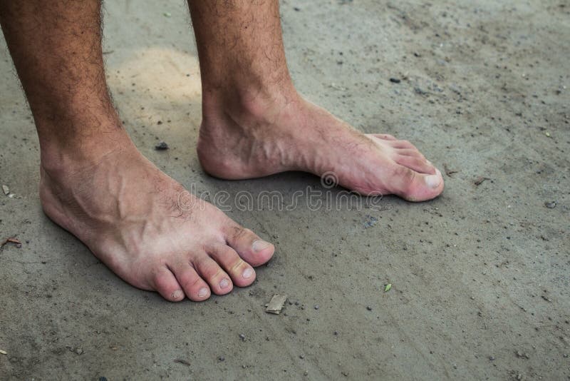 Feet of a Man on the Ground Stock Image Image of health, pair 94742881