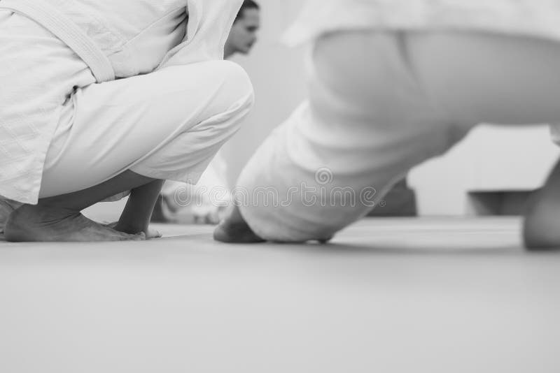 Feet on the tatami in the gym stock photo