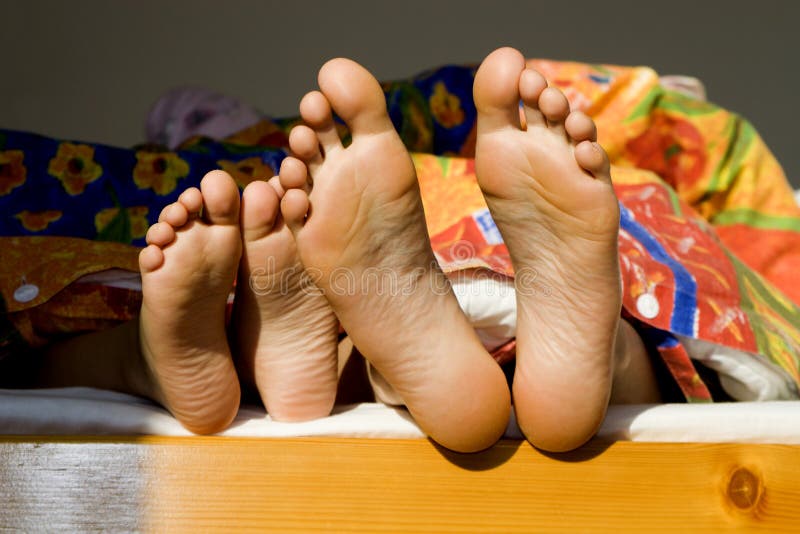 Feet of mother and child