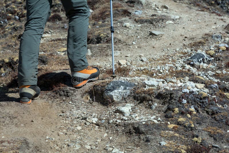 Feet of Mountain Climber in Heavy High Altitude Boots Stock Image