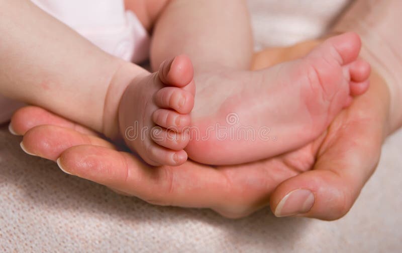 Feet of newborn baby