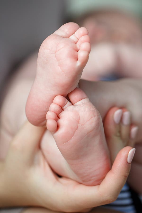 Feet of newborn baby on mother`s palm royalty free stock image Feet of newborn baby on mother`s palm royalty free stock image