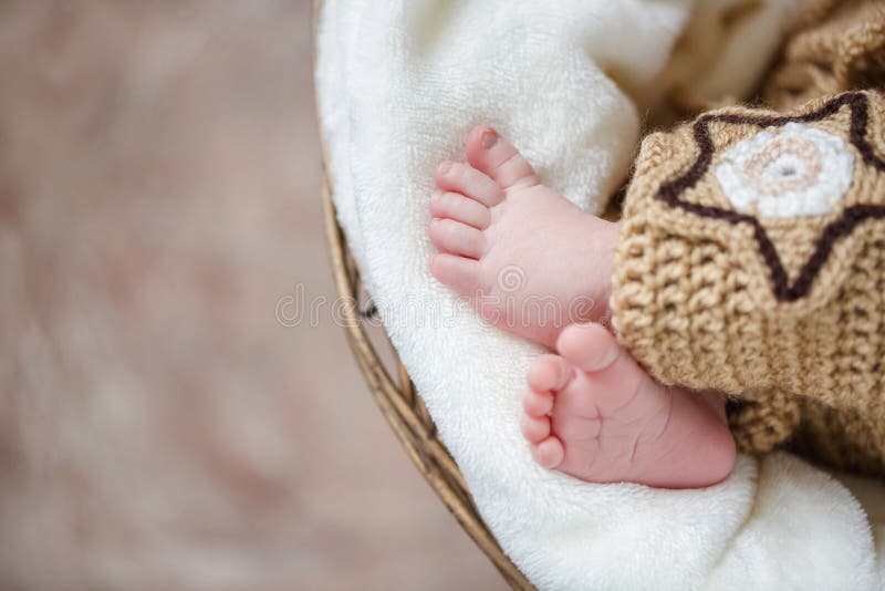 Feet of a newborn baby sleeping on white blanket royalty free stock images Feet of a newborn baby sleeping on white blanket royalty free stock images