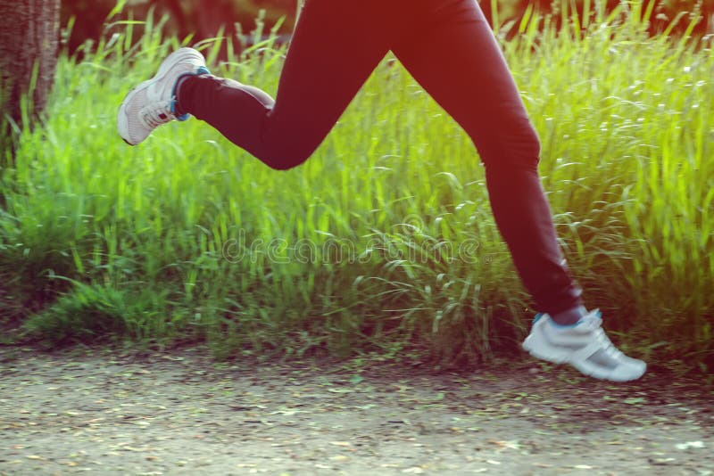 Feet of a running woman stock image. Image of exercise 31206789