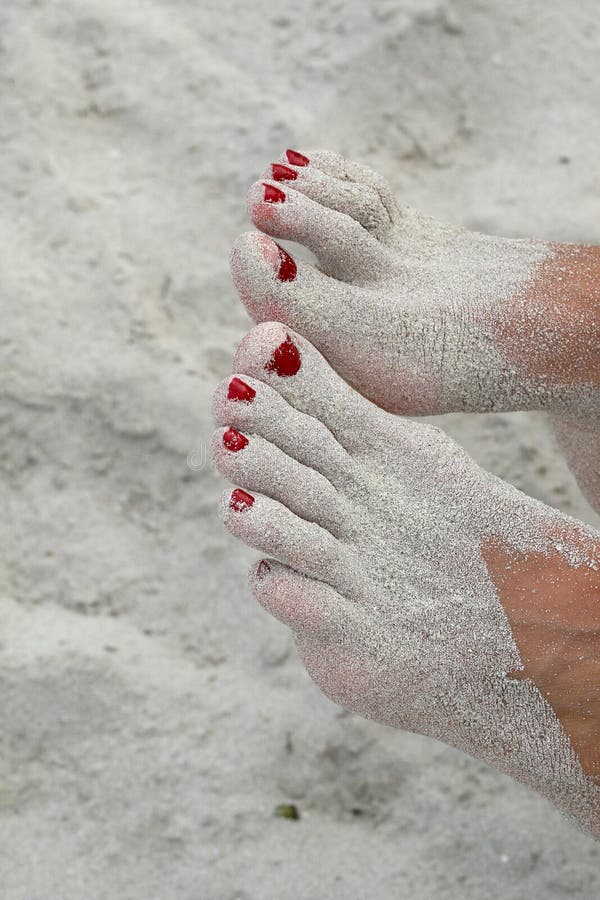 Feet in sand