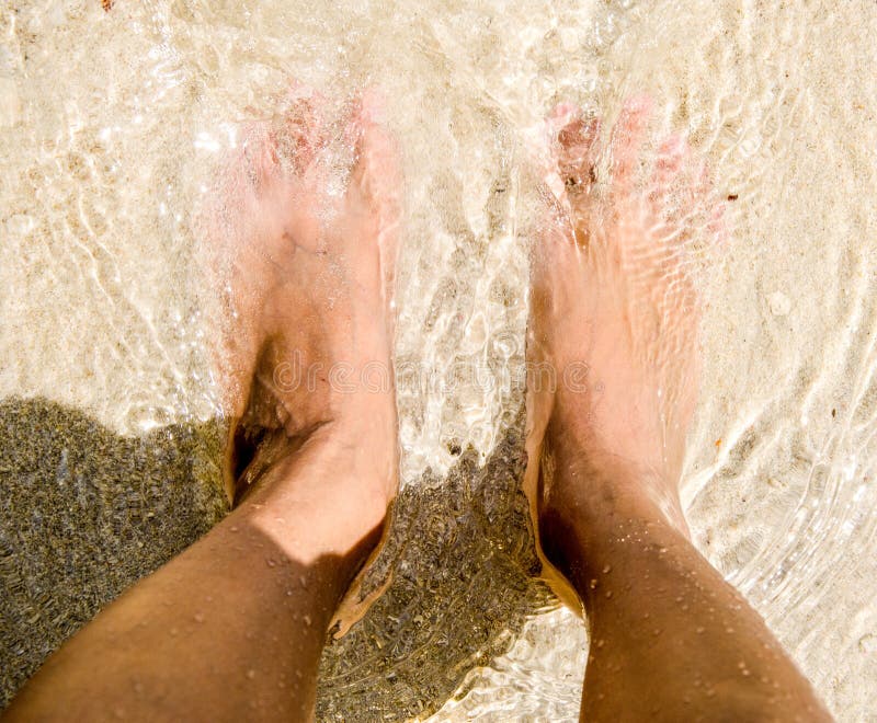 Feet sand sea and me royalty free stock image