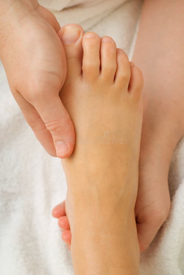 Feet in spa massage bath stock photo. Image of lifestyle 6816384