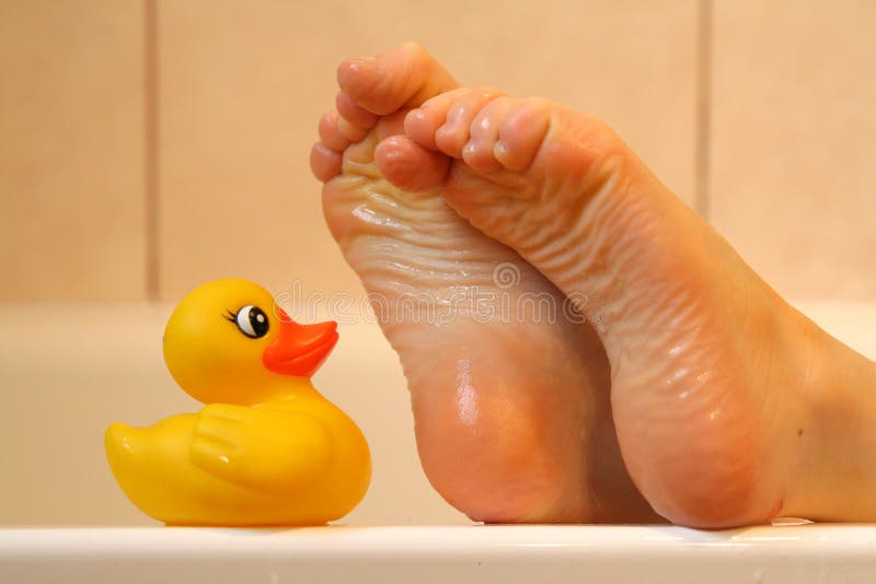 Feet Taking With Bath Duck Stock Image Image Of Bathtube 709703