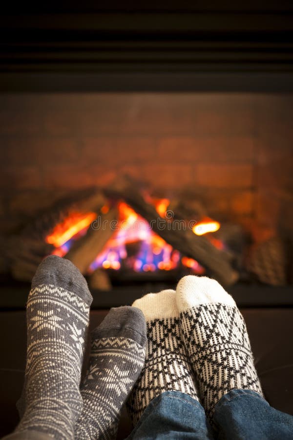 Feet Warming By Fireplace Royalty Free Stock Photography ...