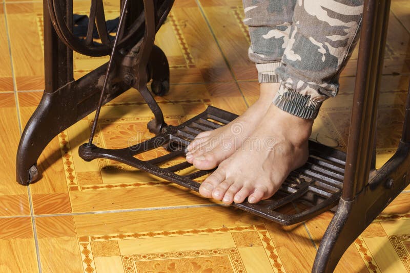 Feet Working on Sewing Machine Retro Style Stock Photo Image of retro