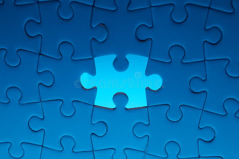 Missing jigsaw puzzle piece with light glow, business concept. Missing jigsaw puzzle piece with light glow, business concept