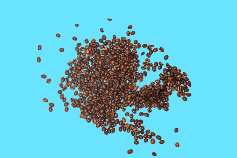 Feijão de café com fundo isolado de turquesa imagens de stock royalty free