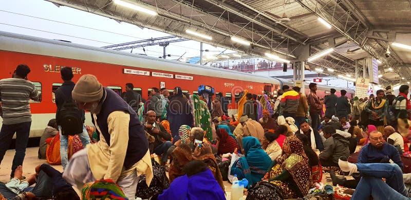 Prayag, India - February 4, 2019: World`s largest religious gathering Kumbh Fair. Millions of Hindu pilgrimages are waiting for the respective train at Prayag railway station. Prayag, India - February 4, 2019: World`s largest religious gathering Kumbh Fair. Millions of Hindu pilgrimages are waiting for the respective train at Prayag railway station.